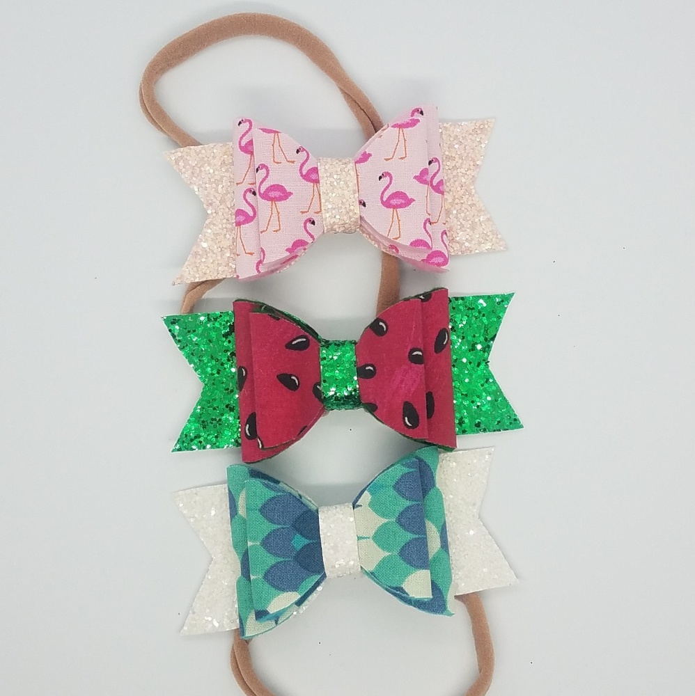 3 hand made hair bows